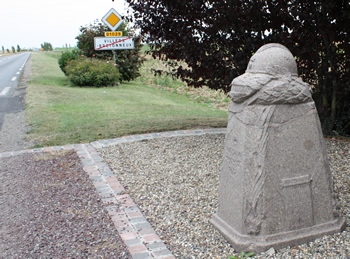 The Demarcation Stone at the eastern 
			entrance to the village of Villers-Bretonneux, east of Amiens in France. The German advance of spring 1918 was halted at this 
			village in April 1918.