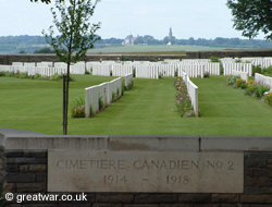 Looking north-west from the cemetery towards the chapel and Lantern Tower at the Notre Dame de Lorette French military cemetery on the opposite ridge.