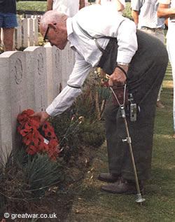 WW1 veteran Tom Price lays a poppy wreath.